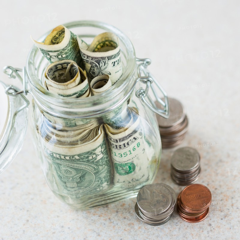 Studio shot of savings in jar.