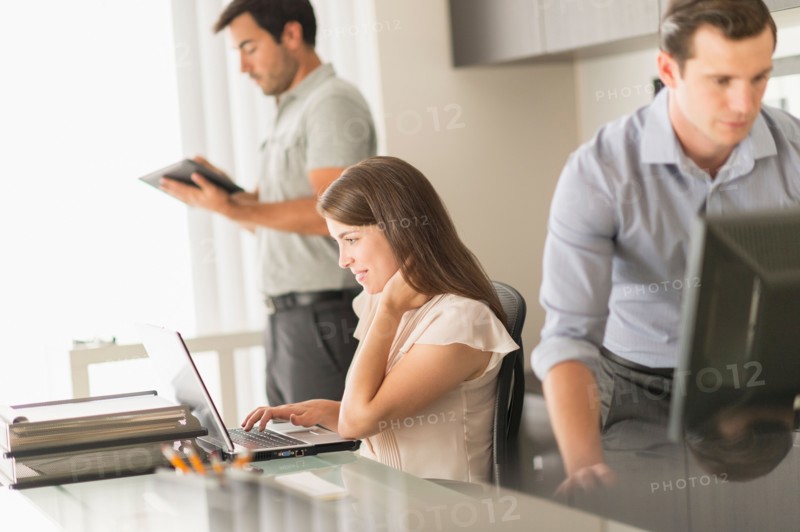 Business people working in office.