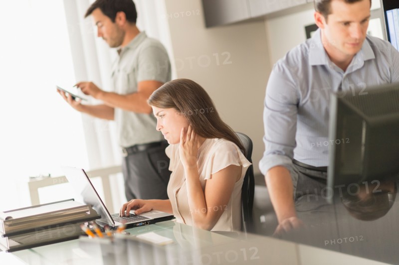Business people working in office.