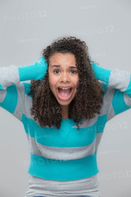 Portrait of girl (12-13) screaming