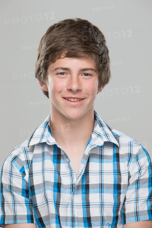 Portrait of teenage boy (14-15) smiling