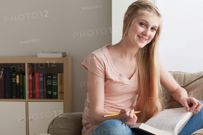 Girl (14-15) studying