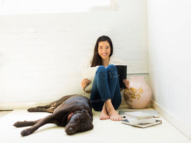 Young woman with labrador