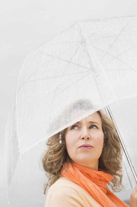 Woman with umbrella.