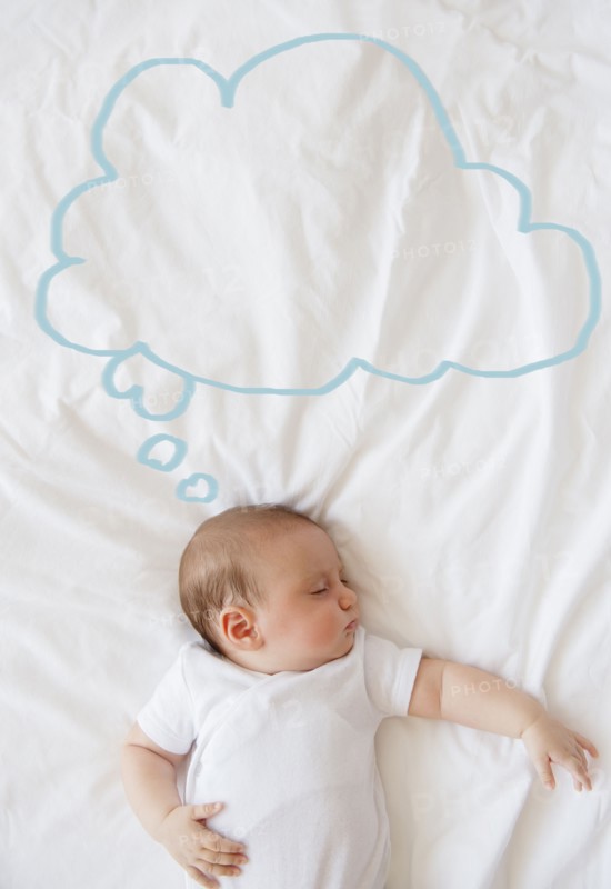 Baby girl (2-5 months) sleeping in bed.
Photo : Jamie Grill
