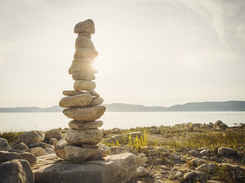 Stack of stones by lake. USA, Utah, Bear Lake.