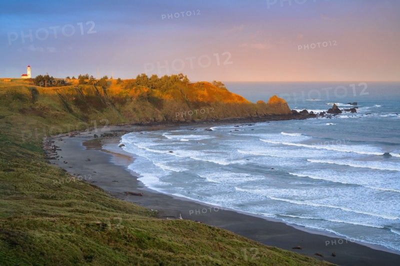 Landscape with lighthouse in distance. USA, Oregon, Cape Blanco.
Photo : Gary Weathers