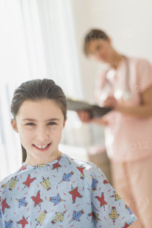 Girl (8-9) in doctor's office.