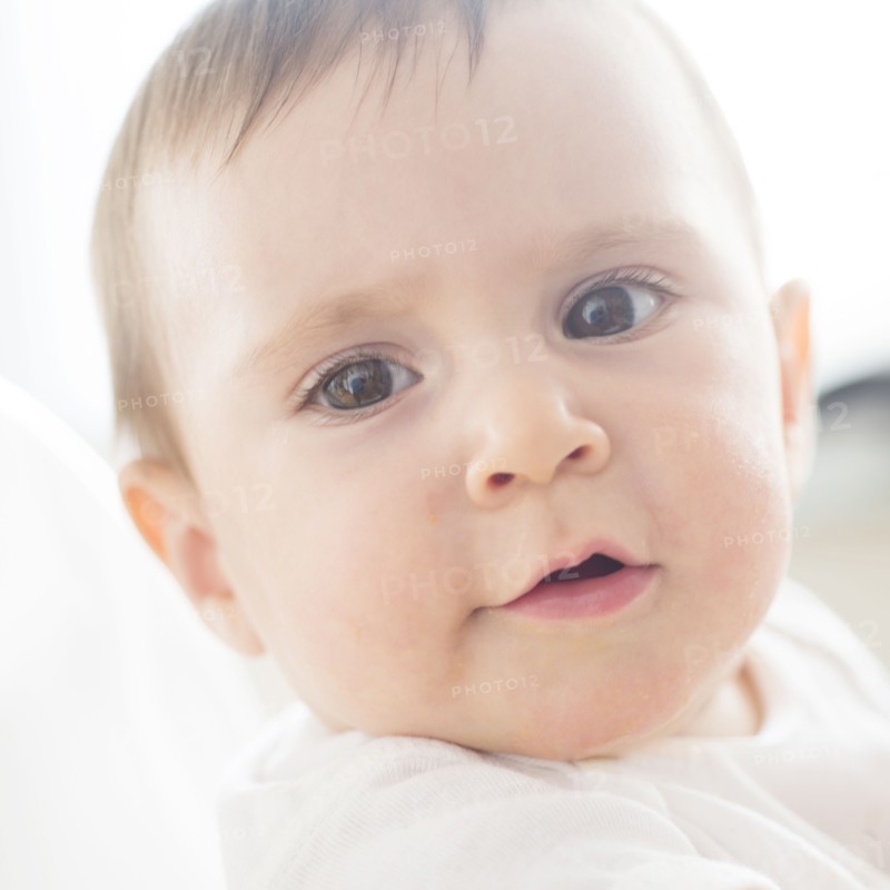 Close-up of baby girl (12-17 months).