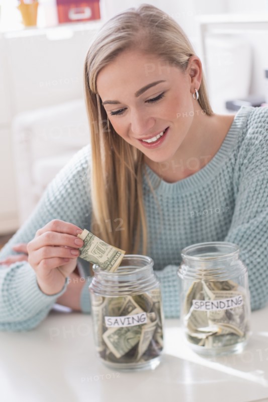 Woman collecting savings.