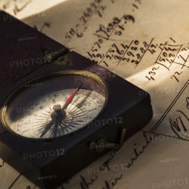 Studio shot of old fashioned compass.
