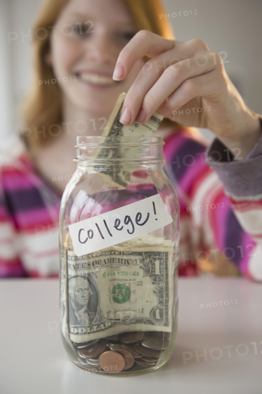 Jar with money.
Photo : Jamie Grill
