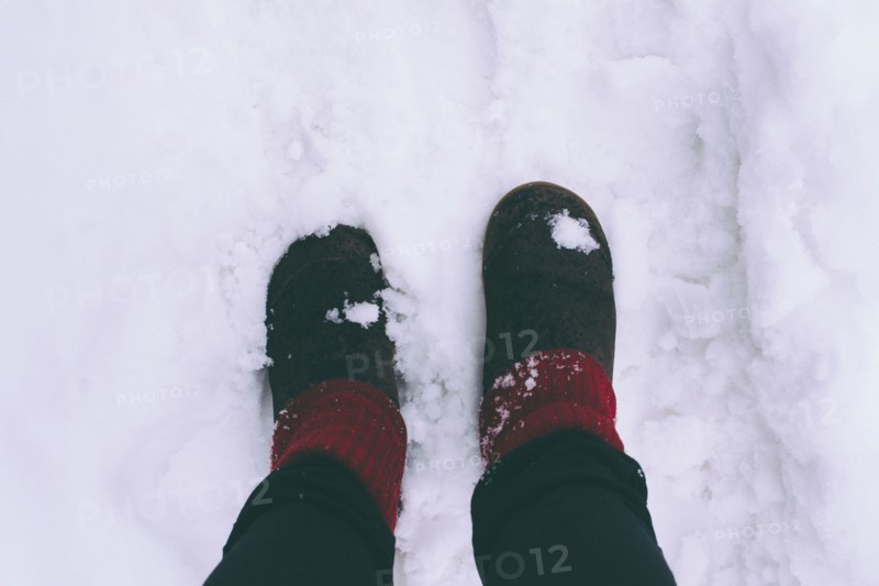 Woman standing on snow, low section.
Photo : Kristin Lee