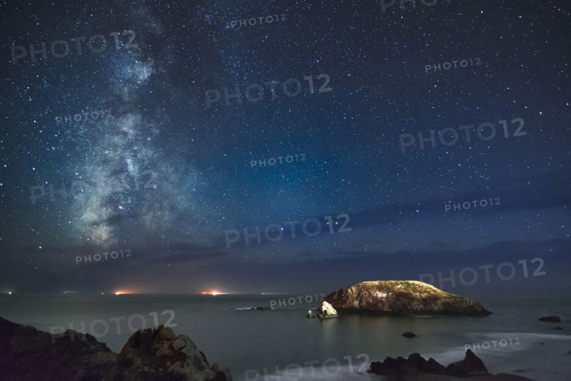 View of Milky Way on night sky over beach. Oregon, USA.
Photo : Gary Weathers