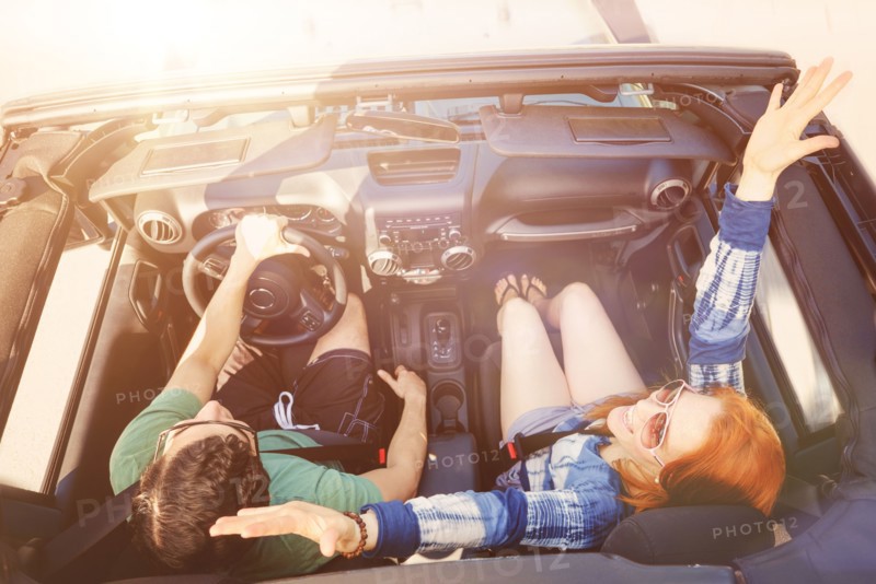 Elevated view of couple in car.