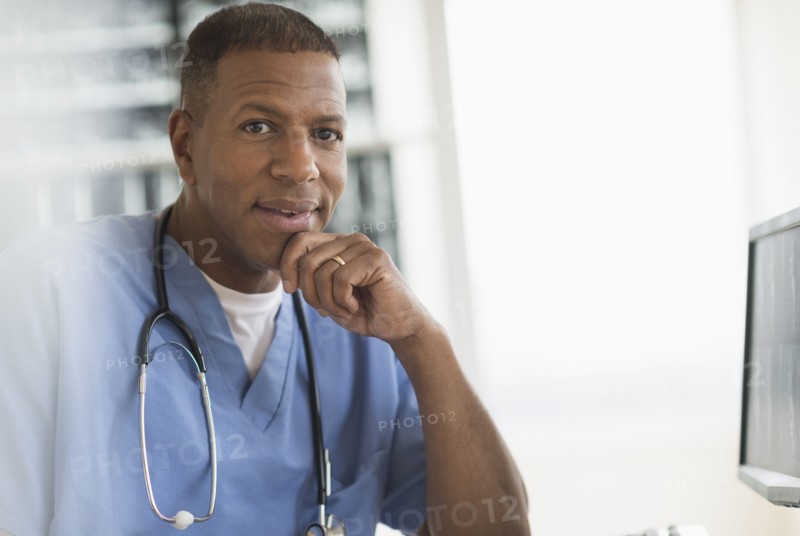 Portrait of male doctor in hospital.