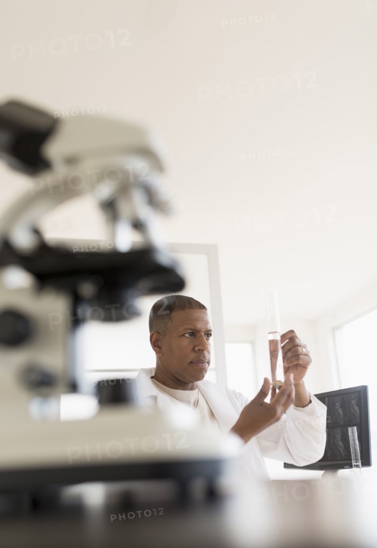 Male technician working in laboratory.