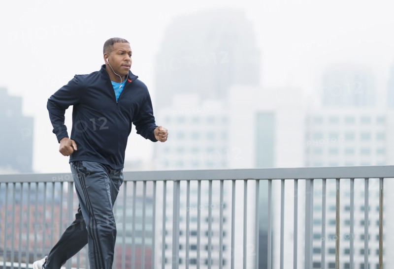 Man running in city.