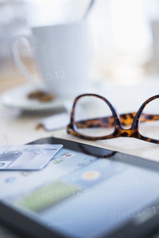 Close up of credit card on digital tablet.