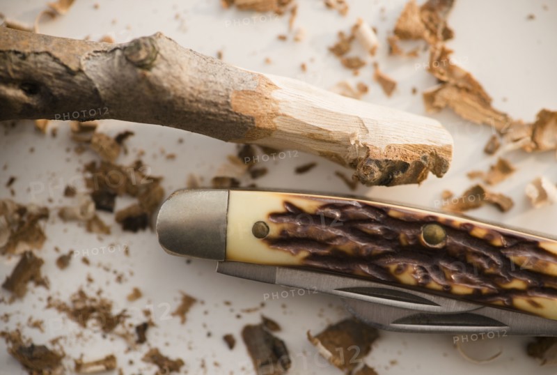 Studio Shot of pocket knife and stick.
Photo : Jamie Grill