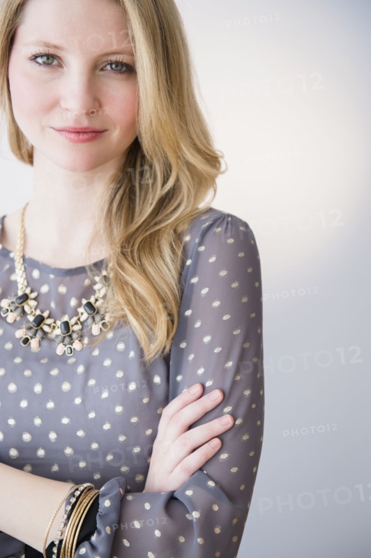 Portrait of attractive blond woman with arms crossed.
Photo : Jamie Grill