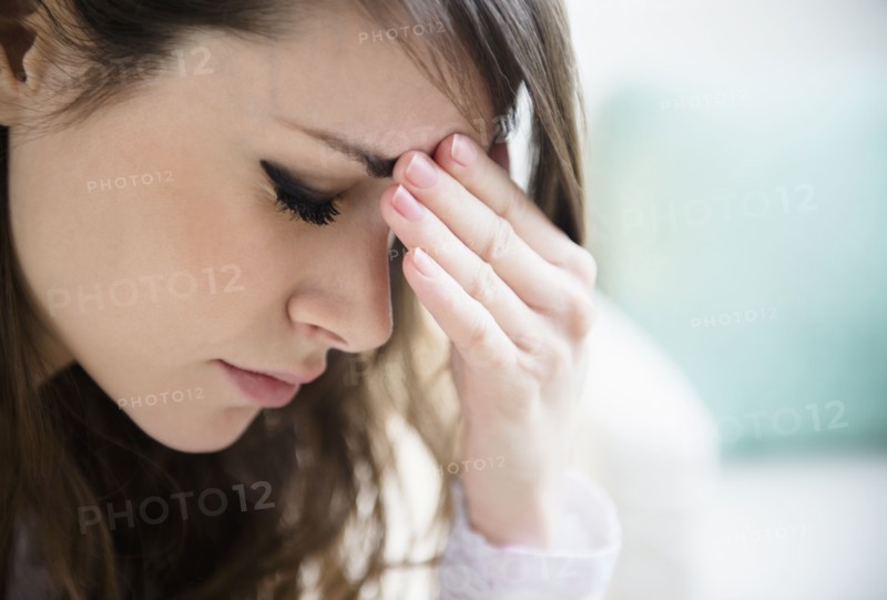 Portrait of young tired woman .
Photo : Jamie Grill