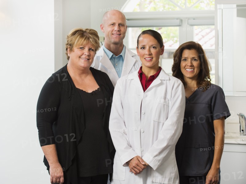 Portrait of dentists and assistants.