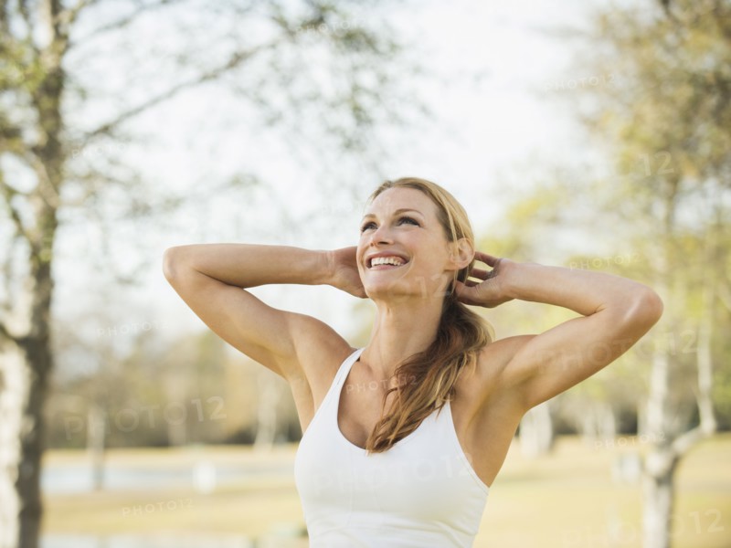 Woman smiling and looking up.