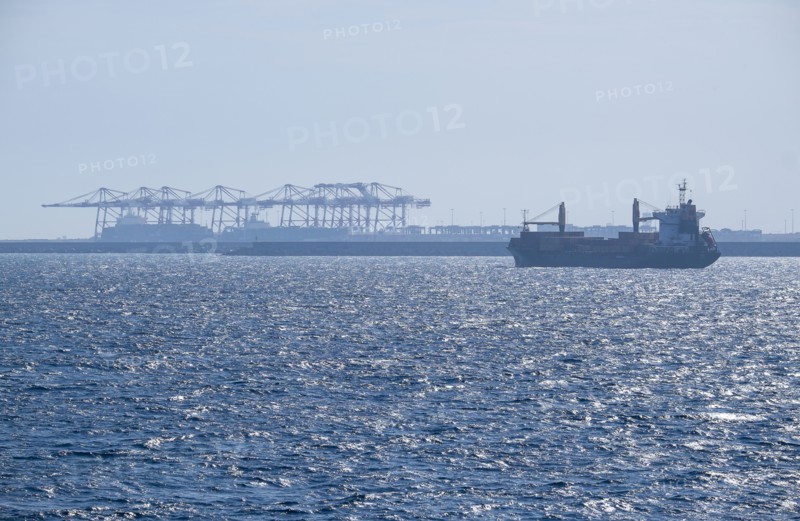 Cargo containers in sun. Mediterranean.