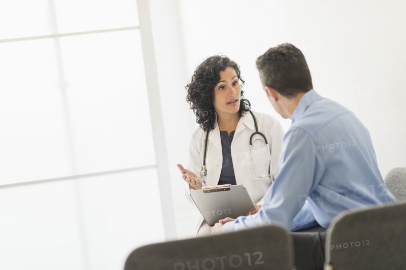 Doctor talking to patient.