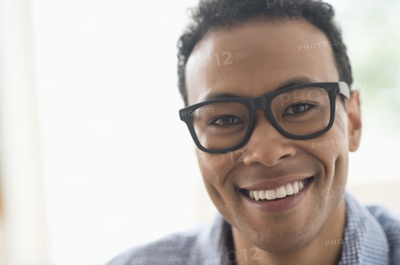 Portrait of young man smiling.