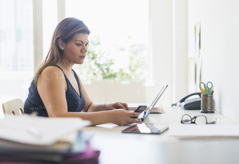 Woman working in home office.