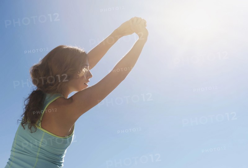Young woman exercising.