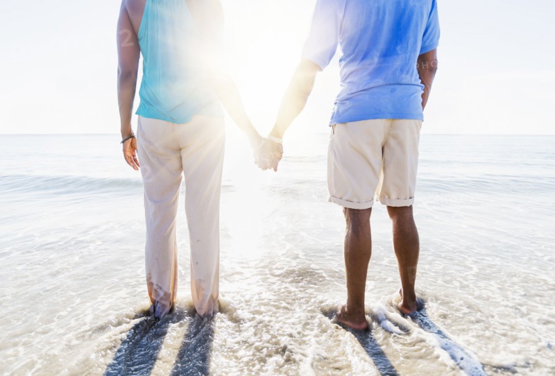Mature couple standing in sea