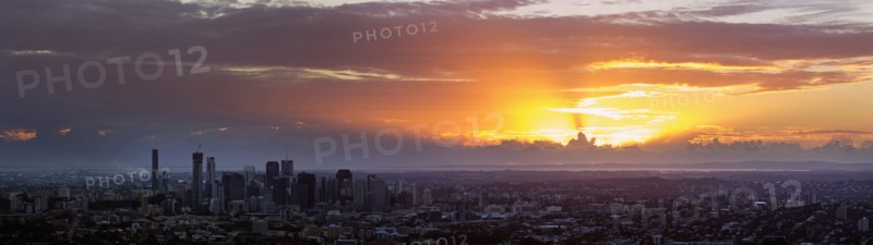 Panoramic view of city at sunrise