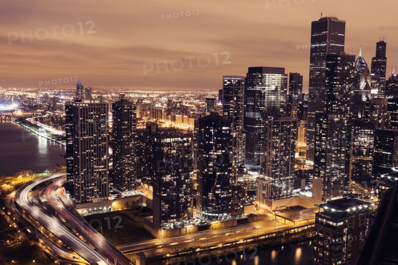 Elevated view of Lake Shore Drive and Chicago architecture at sunset