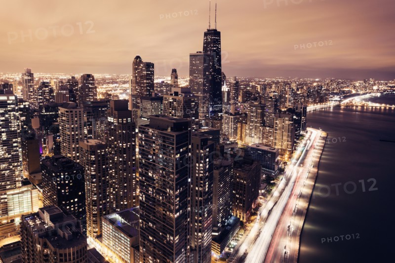 Elevated view of Lake Shore Drive and Chicago architecture at sunset