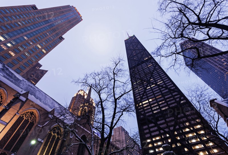 Low angle view of John Hancock Center seen from Fourth Presbyterian Church
