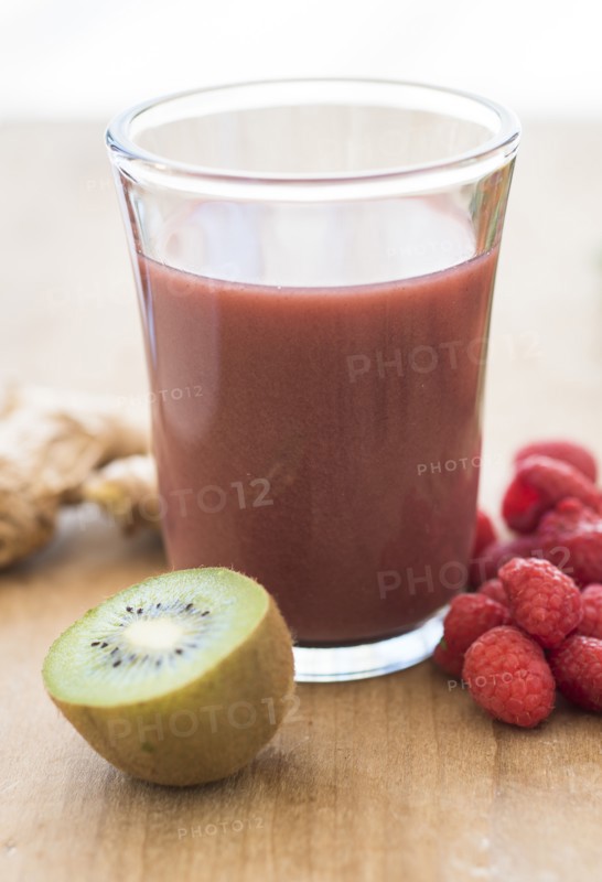 Studio shot of kiwi and raspberry juice.
