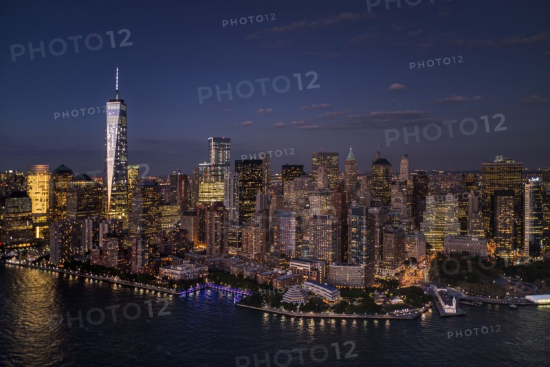 Aerial view of city with Freedom tower at night. New York City, New York.