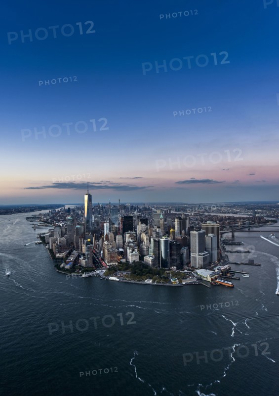 Aerial view of city with Freedom tower at night. New York City, New York.