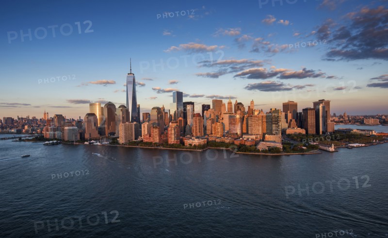 Aerial view of city with Freedom tower at sunset. New York City, New York.