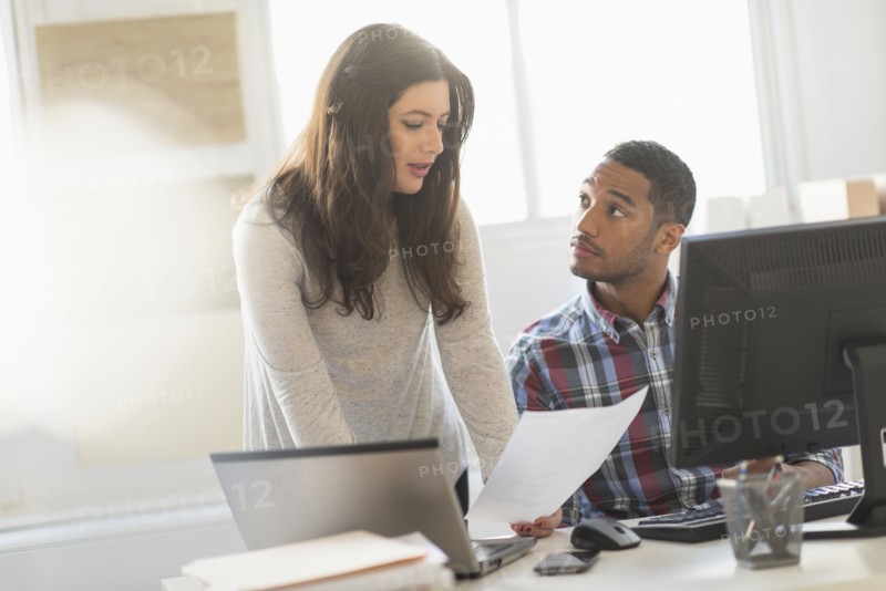 Business couple working in office.
