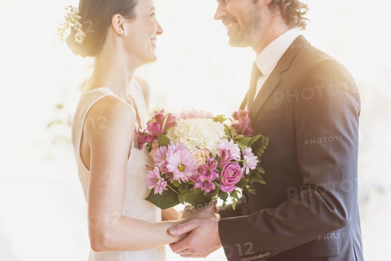 Bride and groom celebrating their wedding.