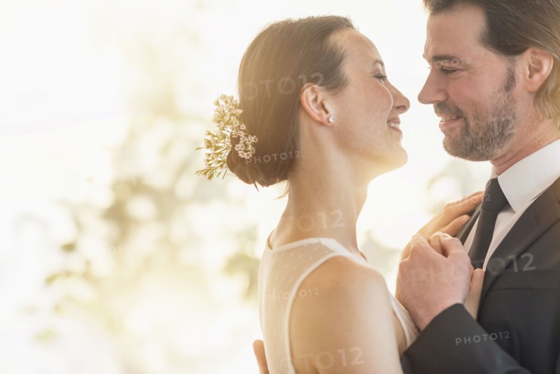 Bride and groom dancing.
