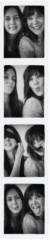 Photo booth picture of teenage girl (14-15) and her mom