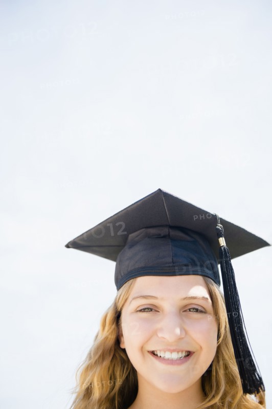 Girl (12-13) in graduation cap