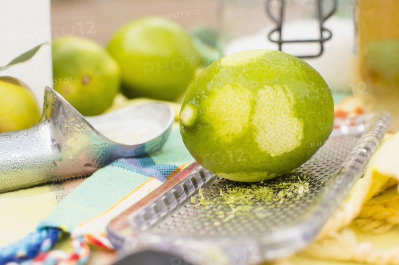 Studio shot of lime and grater
