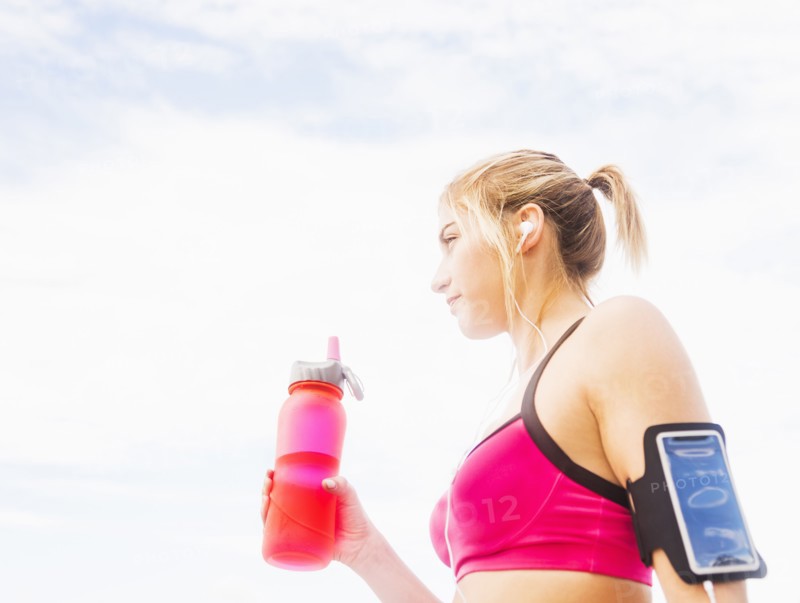 Woman drinking water from bottle