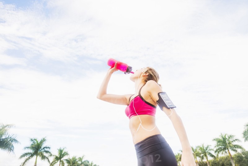 Woman drinking water from bottle